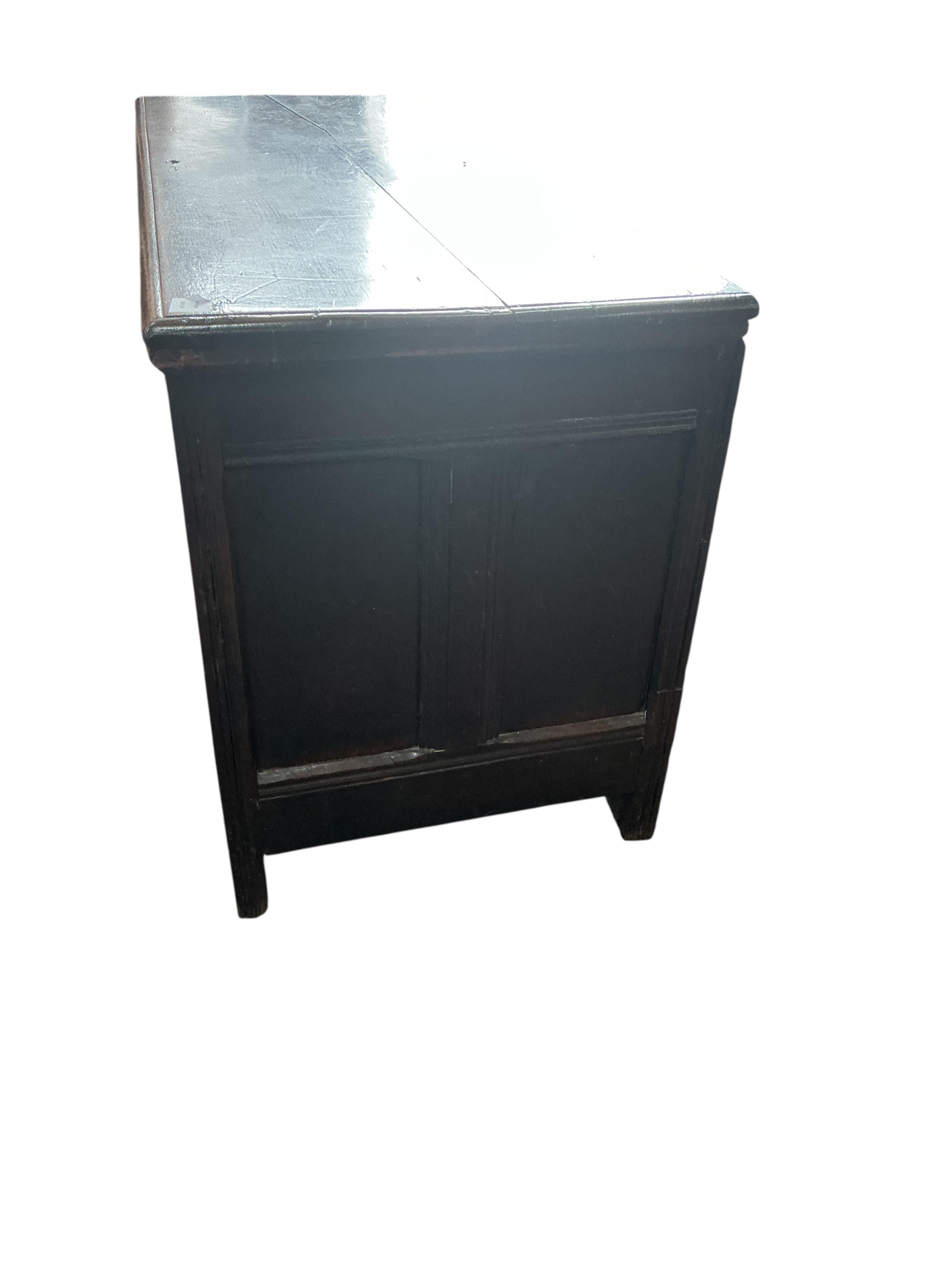 A 17th century carved oak coffer, width 126cm, depth 53cm, height 72cm